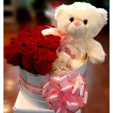 Box of 12 roses and stuffed animal
